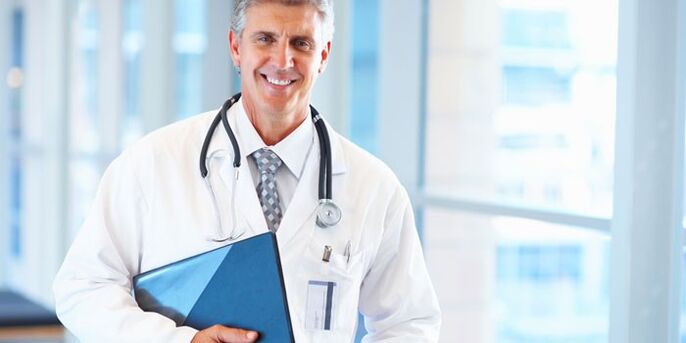 doctor treating nail fungus